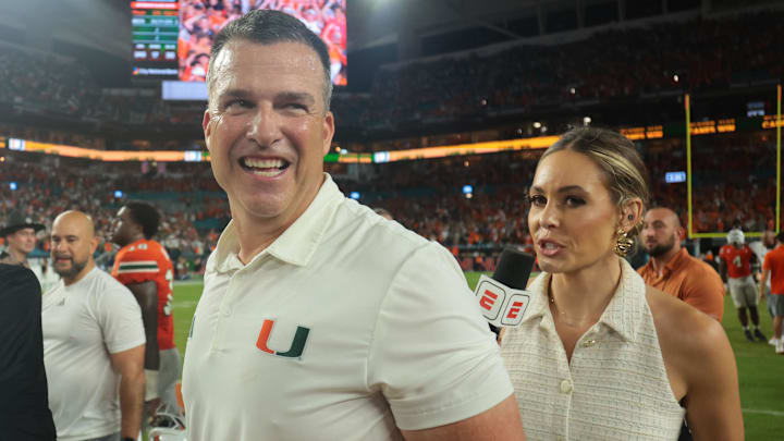 Aug 31, 2025; Miami Gardens, Florida, USA; Miami Hurricanes head coach Mario Cristobal reacts after defeating the Notre Dame Fighting Irish at Hard Rock Stadium. Mandatory Credit: Sam Navarro-Imagn Images