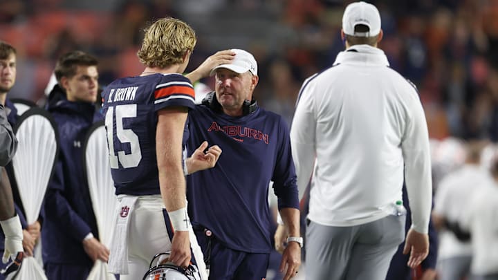 Auburn Tigers head coach Hugh Freeze and quarterback Hank Brown Auburn Tigers head coach Hugh Freeze and quarterback Hank Brown