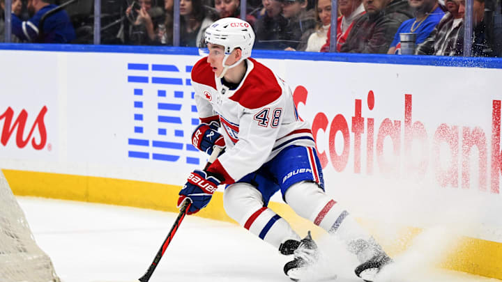 Apr 12, 2025; Toronto, Ontario, CAN;  Montreal Canadiens defenseman Lane Hutson (48) turns behind his goal against the Toronto Maple Leafs in the first period at Scotiabank Arena. Mandatory Credit: Dan Hamilton-Imagn Images
