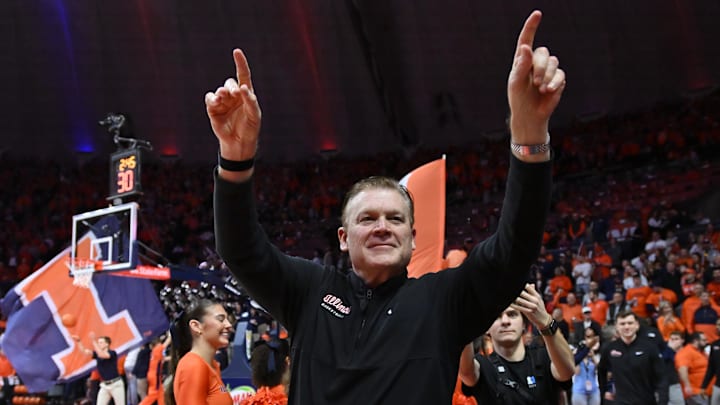 Feb 27, 2026; Champaign, Illinois, USA;  Illinois Fighting Illini head coach Brad Underwood greets the crowd before the first half against the Michigan Wolverines at State Farm Center. Mandatory Credit: Ron Johnson-Imagn Images