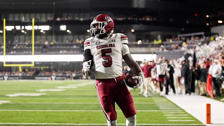 Nov 9, 2024; Nashville, Tennessee, USA;  South Carolina Gamecocks running back Raheim Sanders (5) scores a touchdown against the Vanderbilt Commodores during the second half at FirstBank Stadium. Mandatory Credit: Steve Roberts-Imagn Images