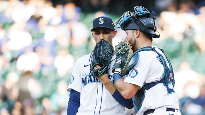 Seattle Mariners starting pitcher George Kirby (68) talks with catcher Cal Raleigh (29) during a second inning mound visit against the Baltimore Orioles at T-Mobile Park on June 3.