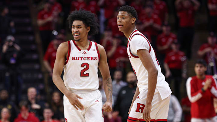 Jan 13, 2025; Piscataway, New Jersey, USA; Rutgers Scarlet Knights guard Dylan Harper (2) celebrates in front of guard Ace Bailey (4) during the second half against the UCLA Bruins at Jersey Mike's Arena. Mandatory Credit: Vincent Carchietta-Imagn Images