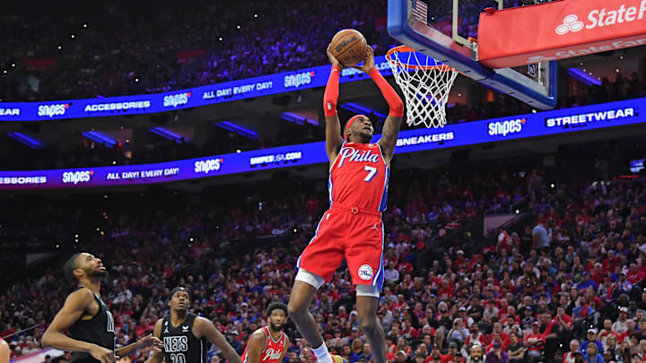 Apr 15, 2023; Philadelphia, Pennsylvania, USA; Philadelphia 76ers forward Jalen McDaniels (7) slam dunks against the Brooklyn Nets during the third quarter of game one of the 2023 NBA playoffs at Wells Fargo Center. Mandatory Credit: Eric Hartline-Imagn Images