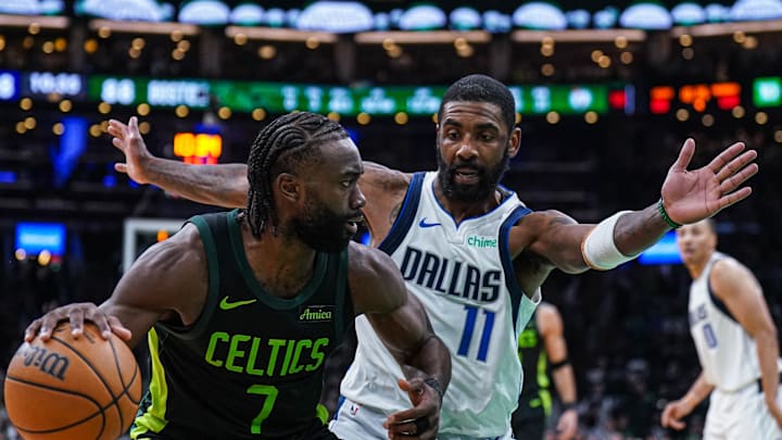 Feb 6, 2025; Boston, Massachusetts, USA; Dallas Mavericks guard Kyrie Irving (11) defends against Boston Celtics guard Jaylen Brown (7) in the second half at TD Garden. Mandatory Credit: David Butler II-Imagn Images