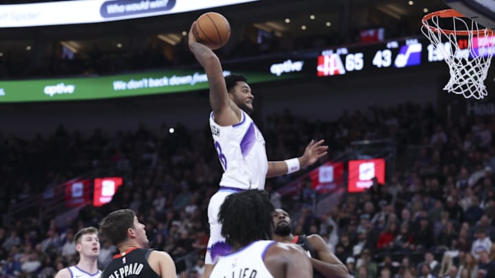 Nov 30, 2025; Salt Lake City, Utah, USA; Utah Jazz forward Brice Sensabaugh (28) dunks against the Houston Rockets during the first half at Delta Center. Mandatory Credit: Rob Gray-Imagn Images