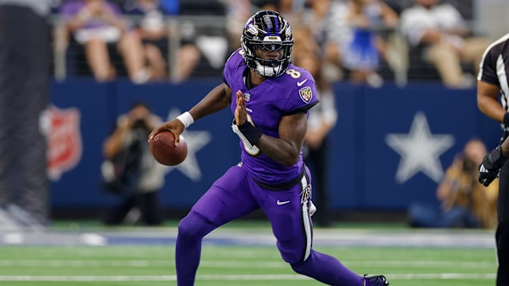 Sep 22, 2024; Arlington, Texas, USA; Baltimore Ravens quarterback Lamar Jackson (8) scrambles during the first quarter against the Dallas Cowboys at AT&T Stadium. Mandatory Credit: Andrew Dieb-Imagn Images