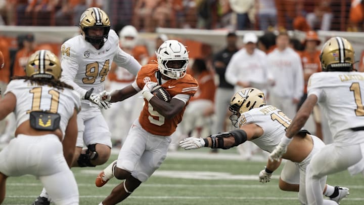 Nov 1, 2025; Austin, Texas, USA; Texas Longhorns running back Quintrevion Wisner (5) runs for yards during the second half against the Vanderbilt Commodores at Darrell K Royal-Texas Memorial Stadium. Mandatory Credit: Scott Wachter-Imagn Images Nov 1, 2025; Austin, Texas, USA; Texas Longhorns running back Quintrevion Wisner (5) runs for yards during the second half against the Vanderbilt Commodores at Darrell K Royal-Texas Memorial Stadium. Mandatory Credit: Scott Wachter-Imagn Images