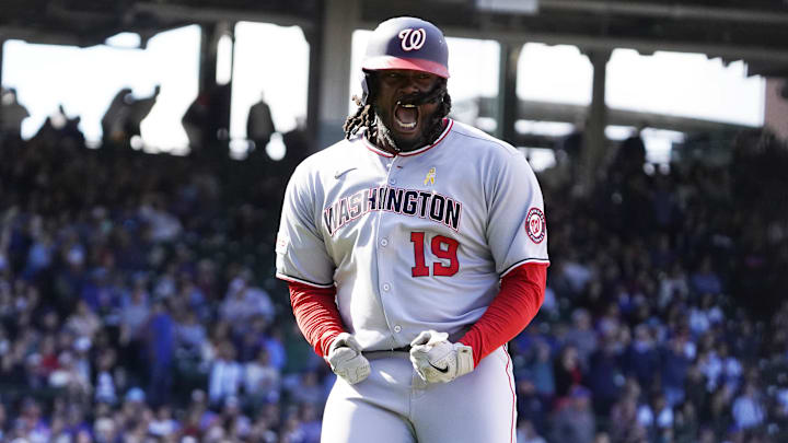 Sep 7, 2025; Chicago, Illinois, USA; Washington Nationals pinch-hitter Josh Bell (19) gestures after hitting a three-run home run against the Chicago Cubs during the ninth inning at Wrigley Field. 