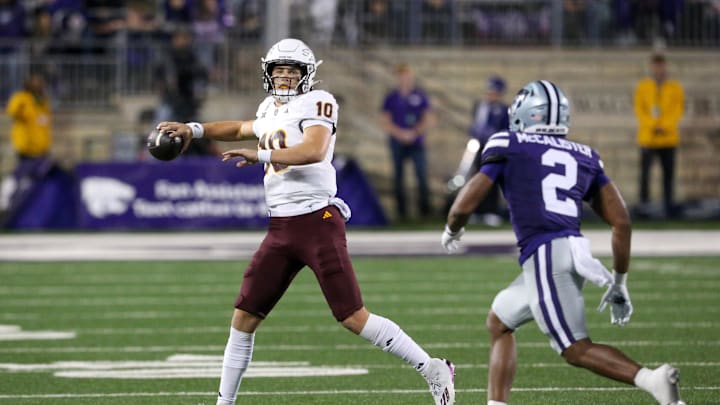 Nov 16, 2024; Manhattan, Kansas, USA; Arizona State Sun Devils quarterback Sam Leavitt (10) drops back to pass against Kansas State Wildcats safety Colby McCalister (2) during the second quarter at Bill Snyder Family Football Stadium. Mandatory Credit: Scott Sewell-Imagn Images