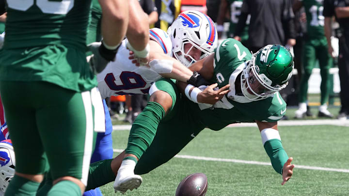 Buffalo Bills defensive end Joey Bosa (97) causes a fumble on New York Jets quarterback Justin Fields (7) during the first half.
