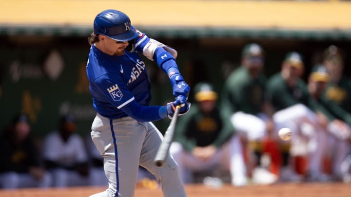 Jun 20, 2024; Oakland, California, USA; Kansas City Royals shortstop Bobby Witt Jr. (7) hits a home run against the Oakland Athletics during the eighth inning at Oakland-Alameda County Coliseum. Mandatory Credit: D. Ross Cameron-USA TODAY Sports