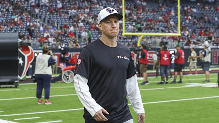 Aug 24, 2024; Houston, Texas, USA; Houston Texans offensive coordinator Bobby Slowik walks on the field before the game against the Los Angeles Rams at NRG Stadium. Mandatory Credit: Troy Taormina-Imagn Images