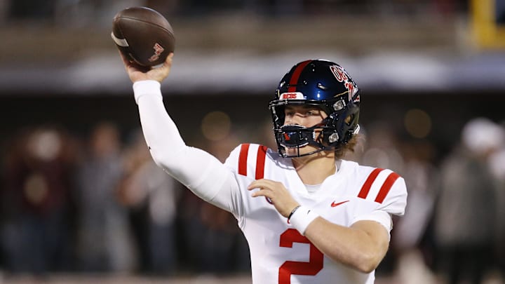 Nov 23, 2023; Starkville, Mississippi, USA; Mississippi Rebels quarterback Jaxson Dart (2) passes