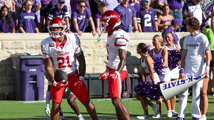 Houston RB Makhi Hughes celebrates a touchdown with WR Koby Young during the second quarter against Kansas State.  Mandatory Credit: Scott Sewell-Imagn Images