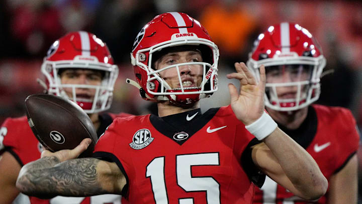 Georgia quarterback Carson Beck (15) warms up before the start of a NCAA college football game against Georgia Tech in Athens, Ga., on Friday, Nov. 29, 2024.