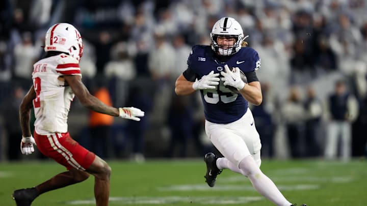 Nov 22, 2025; University Park, Pennsylvania, USA; Penn State Nittany Lions tight end Luke Reynolds (85) runs the ball on a fake punt during the fourth quarter against the Nebraska Cornhuskers at Beaver Stadium. Mandatory Credit: Matthew O'Haren-Imagn Images Nov 22, 2025; University Park, Pennsylvania, USA; Penn State Nittany Lions tight end Luke Reynolds (85) runs the ball on a fake punt during the fourth quarter against the Nebraska Cornhuskers at Beaver Stadium. Mandatory Credit: Matthew O'Haren-Imagn Images