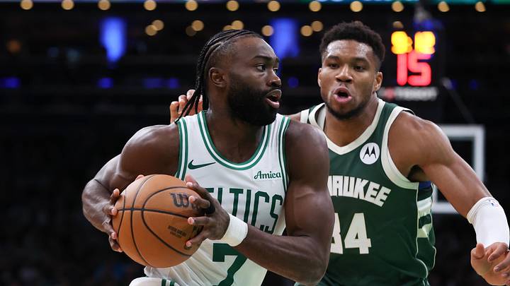 Oct 28, 2024; Boston, Massachusetts, USA; Boston Celtics forward Jaylen Brown (7) drives to the basket defended by Milwaukee Bucks forward Giannis Antetokounmpo (34) during the second half at TD Garden. Mandatory Credit: Paul Rutherford-Imagn Images