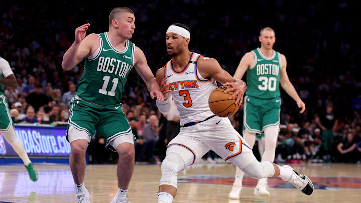 May 16, 2025; New York, New York, USA; New York Knicks guard Josh Hart (3) drives to the basket against Boston Celtics guard Payton Pritchard (11) and forward Sam Hauser (30) during the first quarter of game six in the second round of the 2025 NBA Playoffs at Madison Square Garden. Mandatory Credit: Brad Penner-Imagn Images