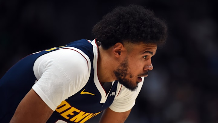 Feb 25, 2026; Denver, Colorado, USA; Denver Nuggets forward Cameron Johnson (23) during the first half against the Boston Celtics at Ball Arena. Mandatory Credit: Christopher Hanewinckel-Imagn Images