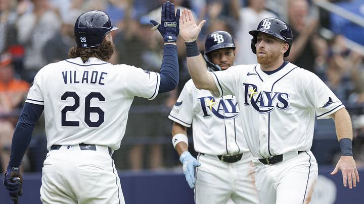 May 20, 2026; St. Petersburg, Florida, USA; Tampa Bay Rays infielder Oliver Dunn (35) reacts with first baseman Ryan Vilade (26) after scoring a run against the Baltimore Orioles in the eighth inning at Tropicana Field. May 20, 2026; St. Petersburg, Florida, USA; Tampa Bay Rays infielder Oliver Dunn (35) reacts with first baseman Ryan Vilade (26) after scoring a run against the Baltimore Orioles in the eighth inning at Tropicana Field.