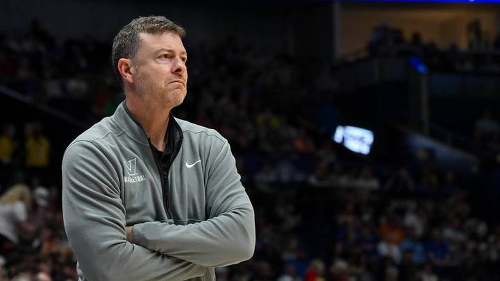 Mar 14, 2026; Nashville, TN, USA;  Vanderbilt Commodores head coach Mark Byington watches against the Florida Gators during the second half at Bridgestone Arena. Mandatory Credit: Steve Roberts-Imagn Images