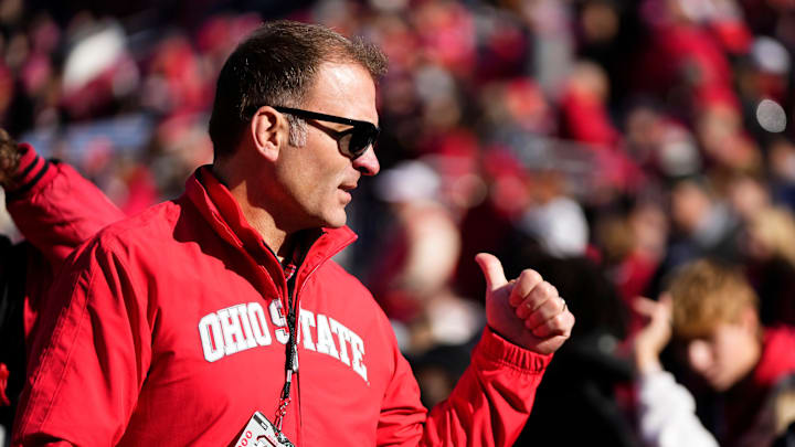Ohio State director of athletics Ross Bjork walks among fans on the sideline prior to the NCAA football game against the Rutgers Scarlet Knights at Ohio Stadium in Columbus on Nov. 22, 2025. Ohio State won 42-9.