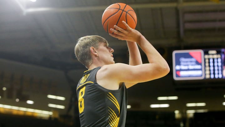 Iowa forward Cooper Koch (8) shoots against South Dakota Tuesday, Nov. 12, 2024 at Carver-Hawkeye Arena in Iowa City, Iowa.