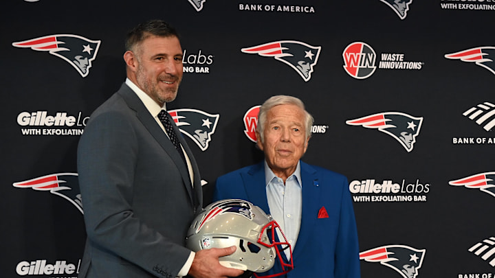 Jan 13, 2025; Foxborough, MA, USA; Mike Vrabel (left) poses for a photo with New England Patriots owner Robert Kraft (right) after a press conference at Gillette Stadium to introduce him as the Patriots new head coach. Mandatory Credit: Eric Canha-Imagn Images