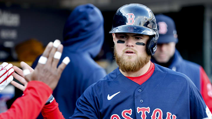 Apr 8, 2023; Detroit, Michigan, USA;  Boston Red Sox second baseman Christian Arroyo (39) receives congratulations from teammates after scoring in the eighth inning against the Detroit Tigers at Comerica Park.