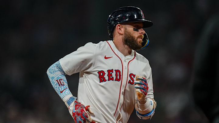 Jun 10, 2025; Boston, Massachusetts, USA; Boston Red Sox shortstop Trevor Story (10) hits a home run against the Tampa Bay Rays in the sixth inning at Fenway Park. Mandatory Credit: David Butler II-Imagn Images