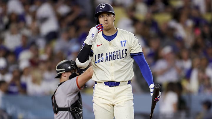 Jun 14, 2025; Los Angeles, California, USA; Los Angeles Dodgers designated hitter Shohei Ohtani reacts after a swinging strike during the sixth inning of a baseball game against the San Francisco Giants at Dodger Stadium. Mandatory Credit: Ryan Sun-Imagn Images Jun 14, 2025; Los Angeles, California, USA; Los Angeles Dodgers designated hitter Shohei Ohtani reacts after a swinging strike during the sixth inning of a baseball game against the San Francisco Giants at Dodger Stadium. Mandatory Credit: Ryan Sun-Imagn Images