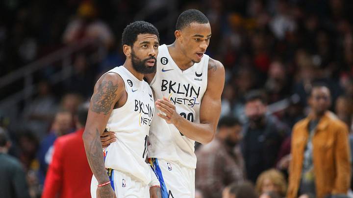 Dec 28, 2022; Atlanta, Georgia, USA; Brooklyn Nets guard Kyrie Irving (11) talks with center Nic Claxton (33) against the Atlanta Hawks in the second half at State Farm Arena. Mandatory Credit: Brett Davis-USA TODAY Sports Dec 28, 2022; Atlanta, Georgia, USA; Brooklyn Nets guard Kyrie Irving (11) talks with center Nic Claxton (33) against the Atlanta Hawks in the second half at State Farm Arena. Mandatory Credit: Brett Davis-USA TODAY Sports