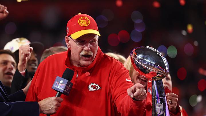 Feb 11, 2024; Paradise, Nevada, USA; Kansas City Chiefs head coach Andy Reid celebrates with the Vince Lombardi Trophy after defeating the San Francisco 49ers in Super Bowl LVIII at Allegiant Stadium. Mandatory Credit: Mark J. Rebilas-Imagn Images