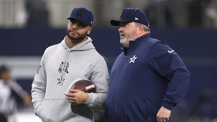 Jan 5, 2025; Arlington, Texas, USA; Dallas Cowboys quarterback Dak Prescott (4) talks to head coach Mike McCarthy before the game against the Washington Commanders at AT&T Stadium. Jan 5, 2025; Arlington, Texas, USA; Dallas Cowboys quarterback Dak Prescott (4) talks to head coach Mike McCarthy before the game against the Washington Commanders at AT&T Stadium.