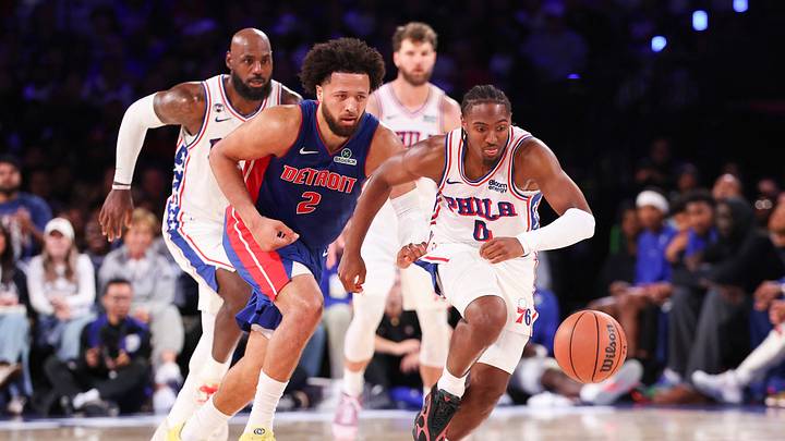 Oct 25, 2026; Philadelphia, Pennsylvania, USA; Philadelphia 76ers guard Tyrese Maxey (0) chases a loose ball in front of Detroit Pistons guard Cade Cunningham (2) during the third quarter at Xfinity Mobile Arena. Mandatory Credit: Bill Streicher-Imagn Images
