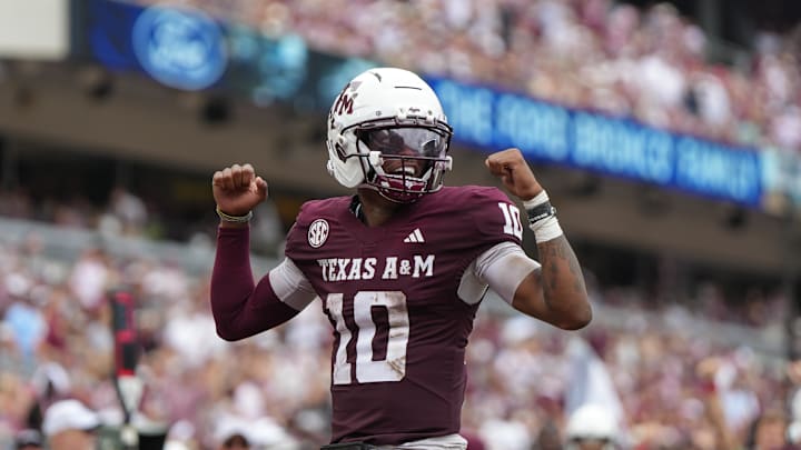 Sep 6, 2025; College Station, Texas, USA; Texas A&M Aggies quarterback Marcel Reed (10) celebrates after a touchdown pass during the second quarter against the Utah State Aggies at Kyle Field. Mandatory Credit: Sean Thomas-Imagn Images