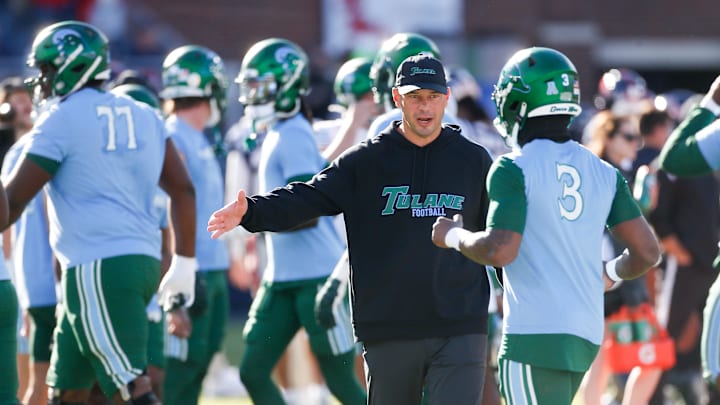 Dec 20, 2025; Oxford, MS, USA; Tulane Green Wave head coach Jon Sumrall on the field prior to a game Mississippi Rebels at Vaught-Hemingway Stadium. Mandatory Credit: Petre Thomas-Imagn Images