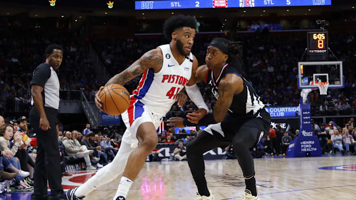 Dec 26, 2022; Detroit, Michigan, USA;  Detroit Pistons forward Saddiq Bey (41) dribbles defended by LA Clippers guard Terance Mann (14) in the first half at Little Caesars Arena. Mandatory Credit: Rick Osentoski-Imagn Images