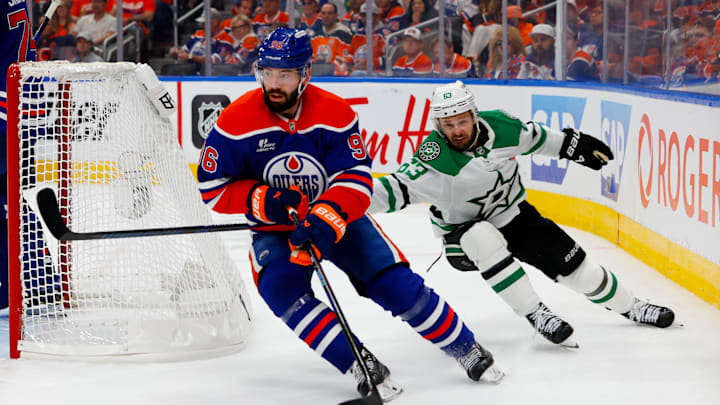 May 25, 2025; Edmonton, Alberta, CAN; Edmonton Oilers defenseman Jake Walman (96) keeps the puck away from Dallas Stars right wing Evgenii Dadonov (63) in game three of the Western Conference Final of the 2025 Stanley Cup Playoffs at Rogers Place. Mandatory Credit: Perry Nelson-Imagn Images May 25, 2025; Edmonton, Alberta, CAN; Edmonton Oilers defenseman Jake Walman (96) keeps the puck away from Dallas Stars right wing Evgenii Dadonov (63) in game three of the Western Conference Final of the 2025 Stanley Cup Playoffs at Rogers Place. Mandatory Credit: Perry Nelson-Imagn Images