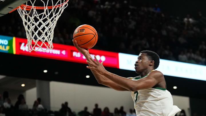 Baylor Bears guard VJ Edgecombe (7) scores a layup against the Houston Cougars during the second half at Paul and Alejandra Foster Pavilion.