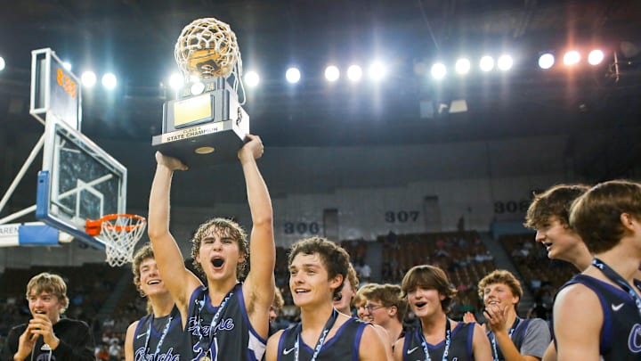 Okarche celebrate winnning the boys basketball Class A state championship game between Caddo and Okarche at Jim Norick Arena in Oklahoma City, on Saturday, March 2, 2024.