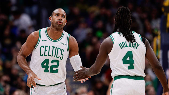 Jan 7, 2025; Denver, Colorado, USA; Boston Celtics center Al Horford (42) and guard Jrue Holiday (4) in the first quarter against the Denver Nuggets at Ball Arena. Mandatory Credit: Isaiah J. Downing-Imagn Images Jan 7, 2025; Denver, Colorado, USA; Boston Celtics center Al Horford (42) and guard Jrue Holiday (4) in the first quarter against the Denver Nuggets at Ball Arena. Mandatory Credit: Isaiah J. Downing-Imagn Images