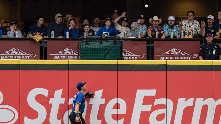 Seattle Mariners left fielder Dominic Canzone (8) watches a home run hit by Minnesota Twins shortstop Carlos Correa (4) during the sixth inning at T-Mobile Park in 2024.