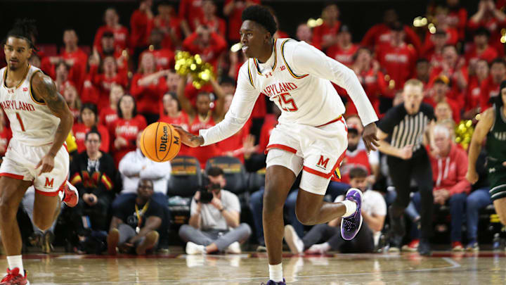 Nov 4, 2024; College Park, Maryland, USA; Maryland Terrapins center Derik Queen (25) dribbles the ball during the second half against the Manhattan Jaspers at Xfinity Center. Mandatory Credit: Daniel Kucin Jr.-Imagn Images