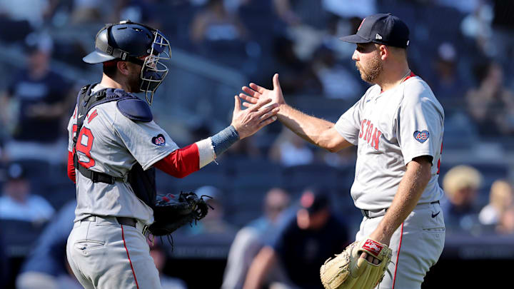 Sep 14, 2024; Bronx, New York, USA; Boston Red Sox catcher Danny Jansen (28) and relief pitcher Greg Weissert (57) celebrate after defeating the New York Yankees at Yankee Stadium. Mandatory Credit: Brad Penner-Imagn Images