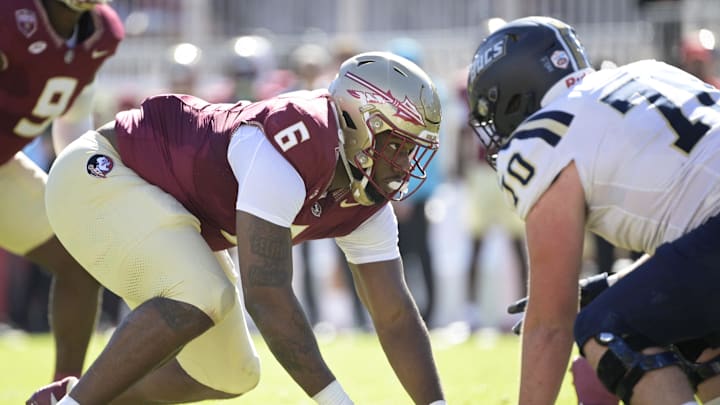 Nov 23, 2024; Tallahassee, Florida, USA; Florida State Seminoles defensive lineman Darrell Jackson Jr. (6) prepares for the snap during the first quarter against the Charleston Southern Buccaneers at Doak S. Campbell Stadium. Mandatory Credit: Melina Myers-Imagn Images