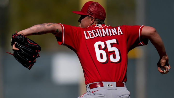 Cincinnati Reds relief pitcher Casey Legumina (65) throws live batting practice.