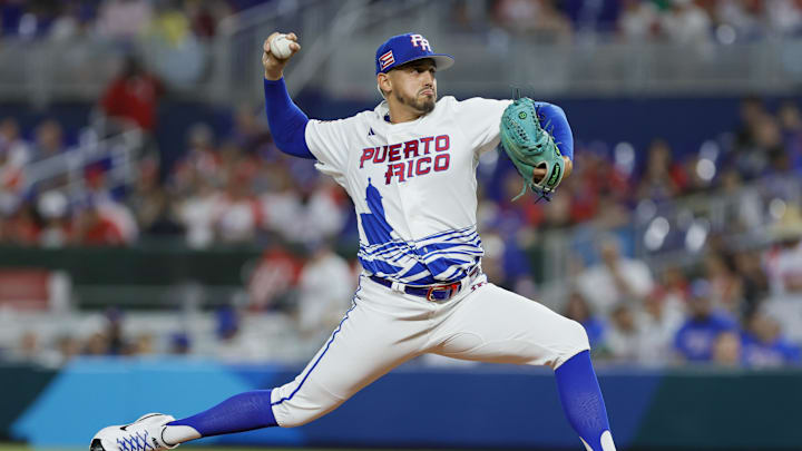 Mar 13, 2023; Miami, Florida, USA; Puerto Rico starting pitcher pitcher Jose De Leon (87) delivers a pitch during the first inning against Israel at LoanDepot Park. Mandatory Credit: Sam Navarro-Imagn Images