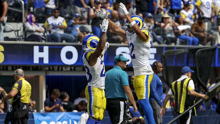 Sep 7, 2025; Inglewood, California, USA; Los Angeles Rams running back Kyren Williams (23) and Los Angeles Rams wide receiver Puka Nacua (12) celebrate after Los Angeles Rams running back Kyren Williams (23) scored a touchtown during the second quarter at SoFi Stadium. Mandatory Credit: Kiyoshi Mio-Imagn Images